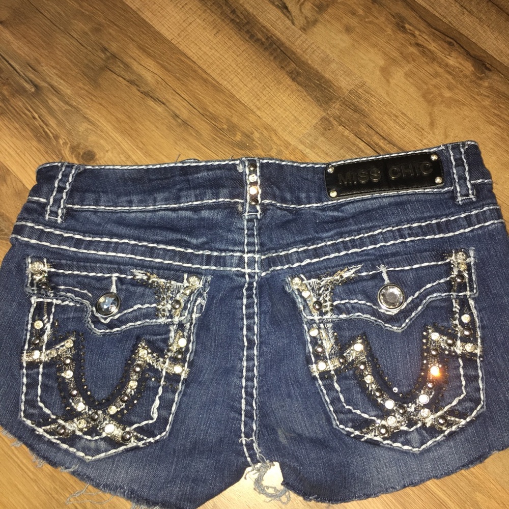 Cut denim shorts